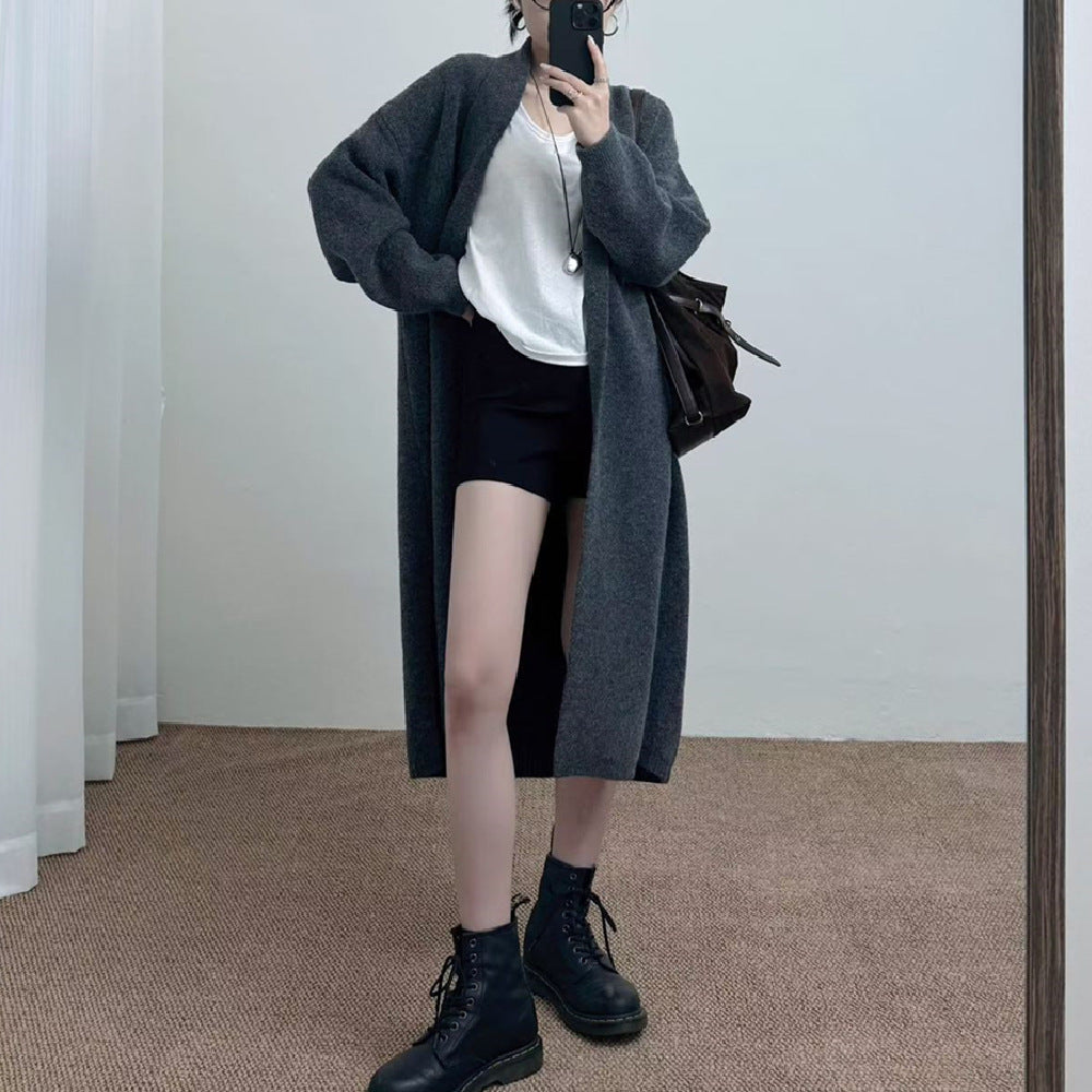 Loose solid color medium length sweater