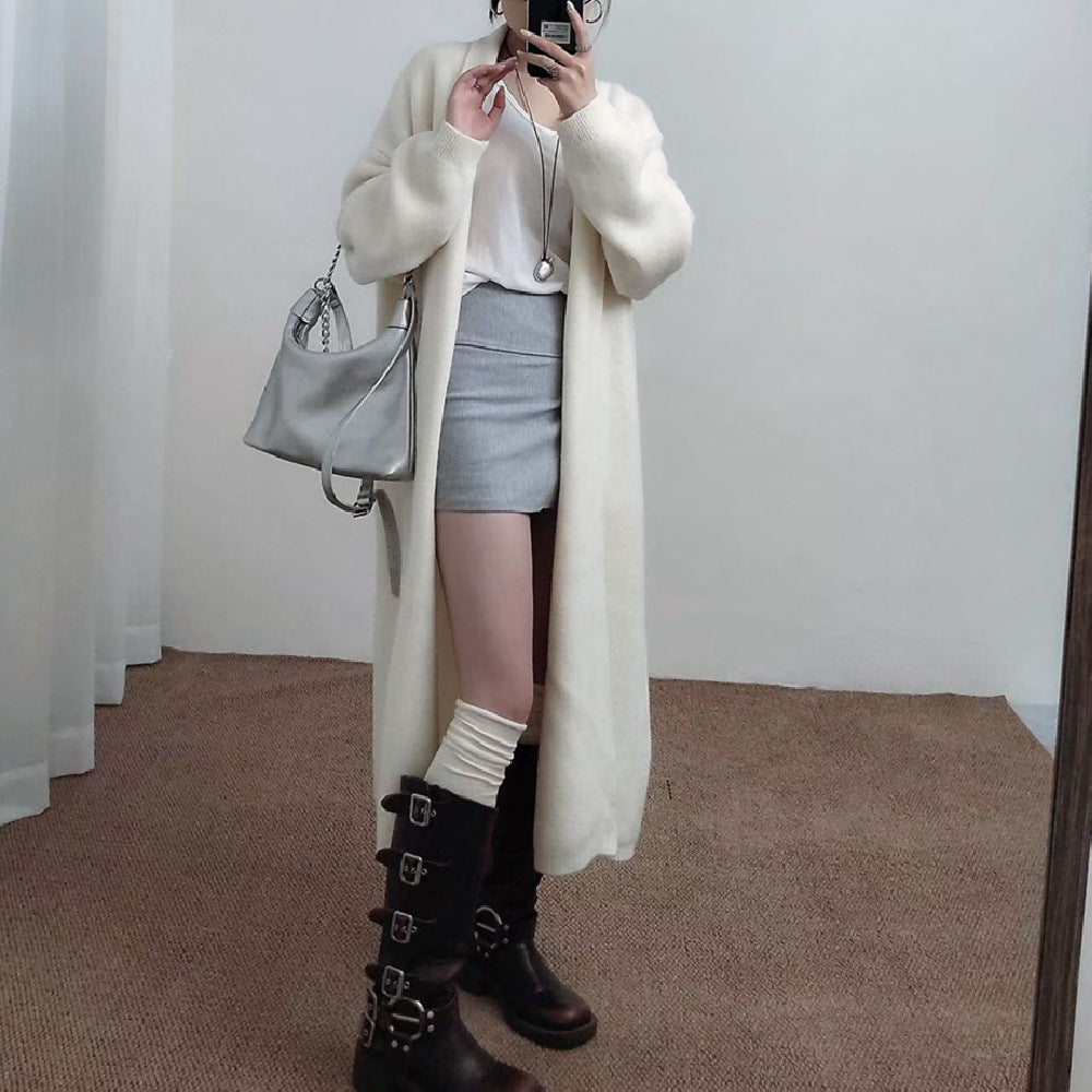 Loose solid color medium length sweater