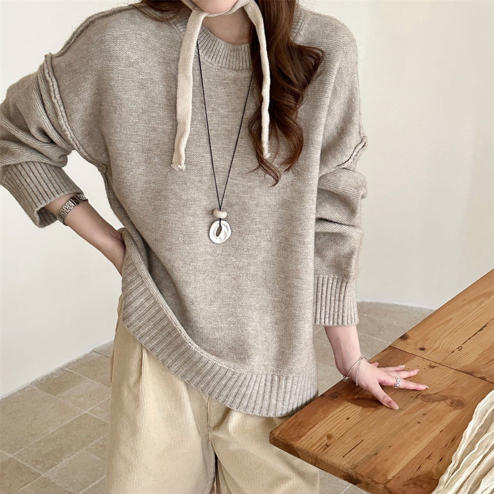 Round neck loose solid color long sleeved sweater